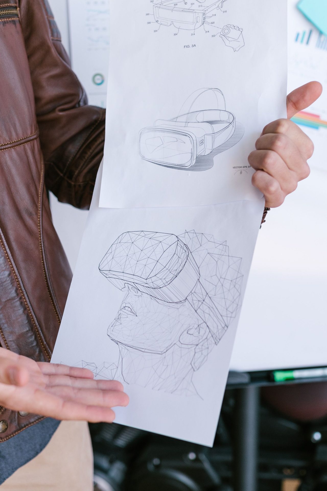 Product designer holding design sketches